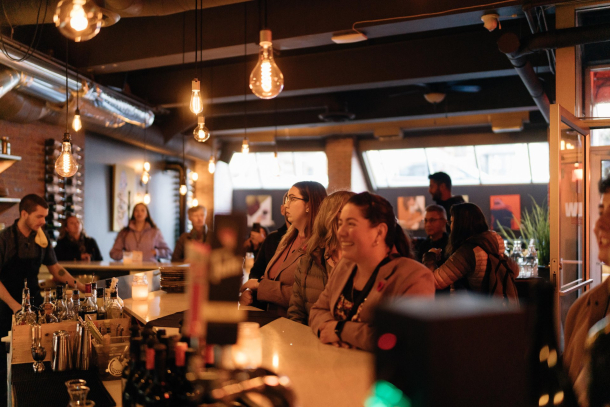 Relaxed vibes and good company at a cozy winebar in Kensington.